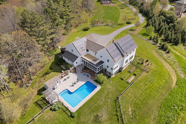 view from above of property with a pool area