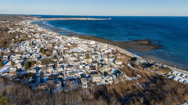 aerial view with a water view and a view of the beach