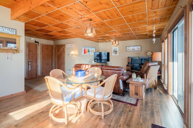 dining room featuring wood-type flooring