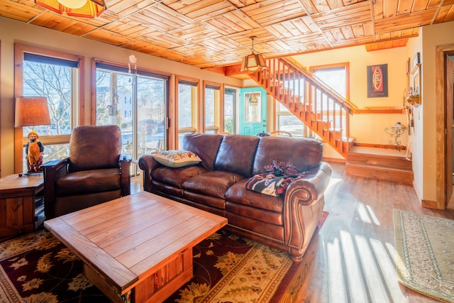 living room with wood ceiling and hardwood / wood-style flooring