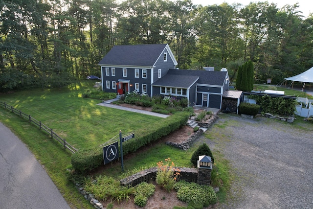 view of front of home with a front lawn