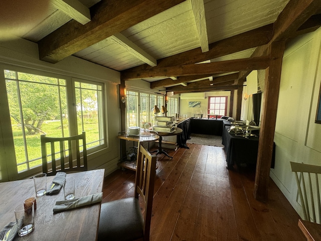 dining area with wood ceiling, dark hardwood / wood-style flooring, and vaulted ceiling with beams