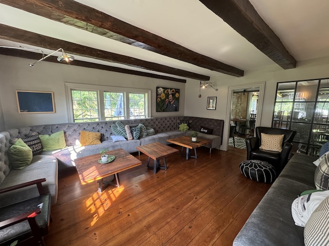 living room with beam ceiling and wood-type flooring