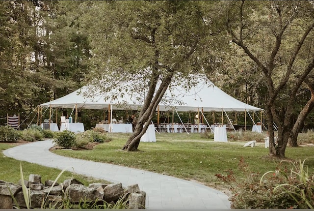 view of property's community with a gazebo and a lawn