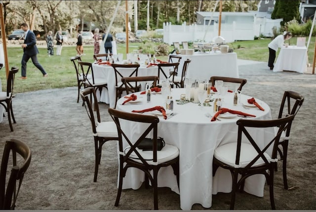 dining space featuring carpet