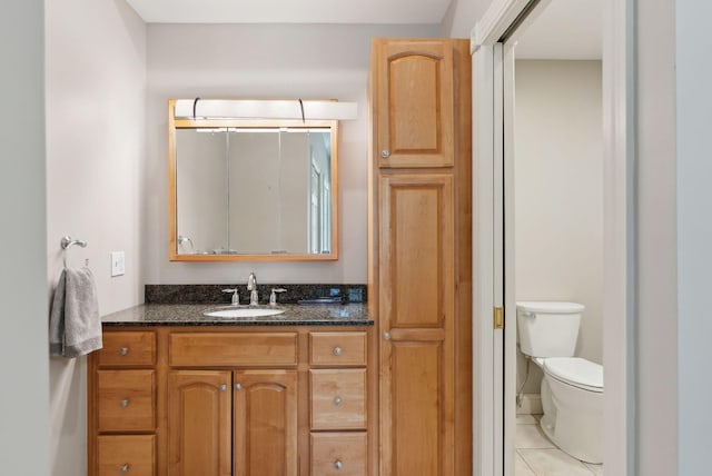 31 Estates Dr Unit 3, Manchester, ME 04351 - bathroom with tile patterned floors, toilet, and vanity