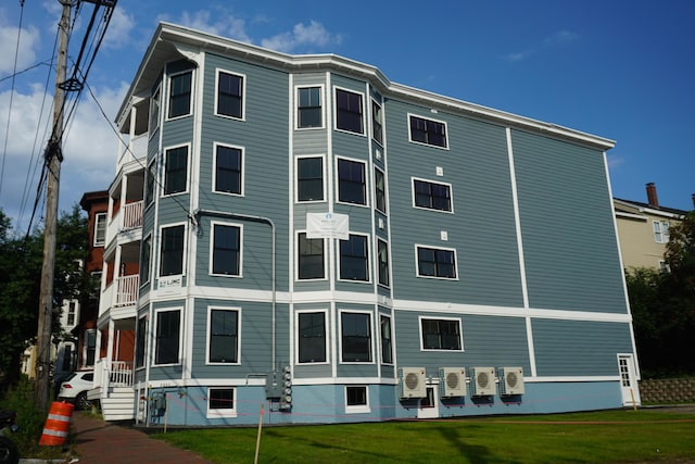 view of building exterior with ac unit