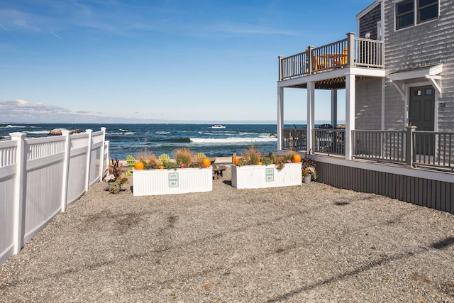 exterior space with a water view