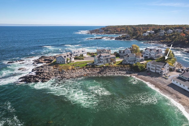 drone / aerial view with a view of the beach and a water view