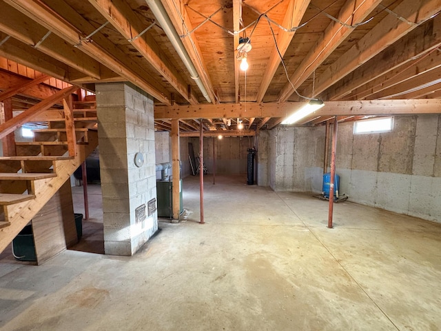 basement featuring water heater