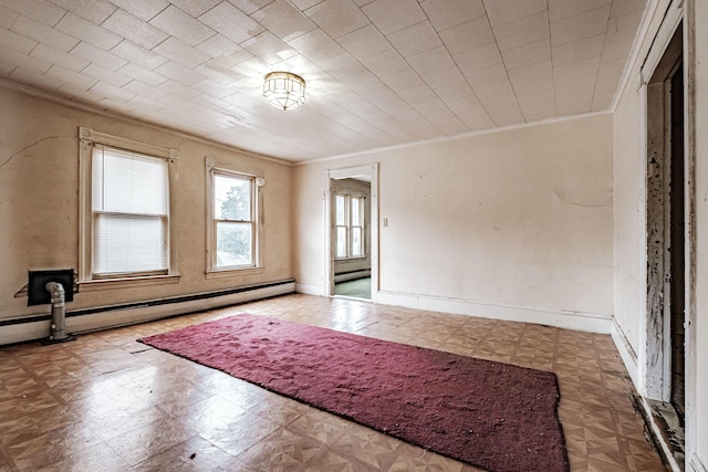 empty room with a baseboard radiator and ornamental molding