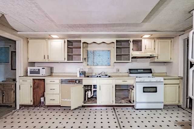 kitchen with sink and white appliances