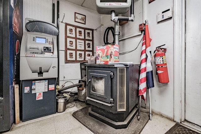 interior space featuring a wood stove