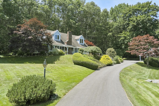 exterior space featuring a front lawn