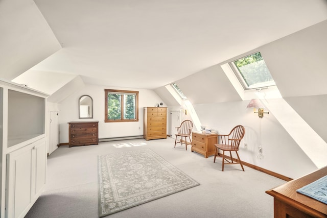 bonus room featuring a baseboard radiator, vaulted ceiling with skylight, and light carpet