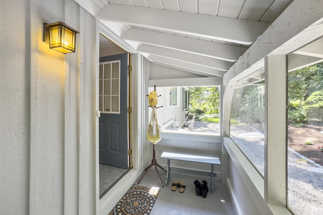 sunroom / solarium with vaulted ceiling