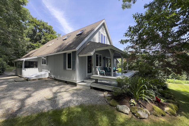 rear view of property with a patio area