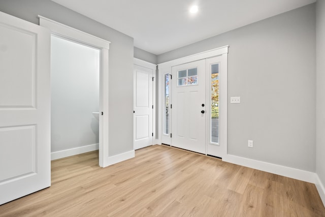 foyer featuring light wood-type flooring