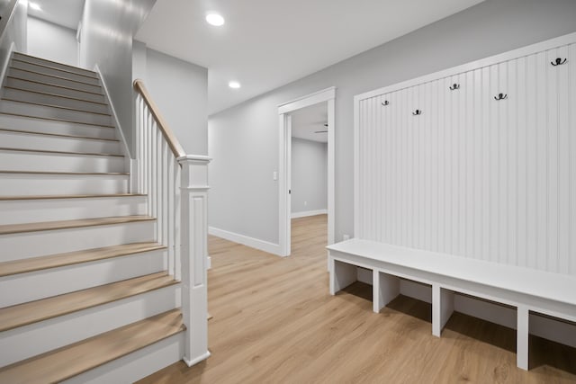 mudroom with light hardwood / wood-style floors