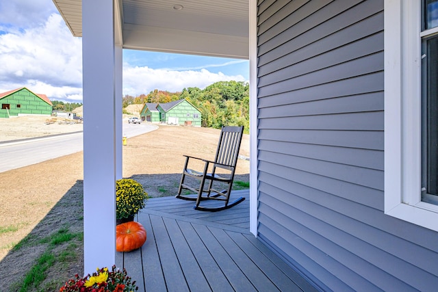 wooden terrace with covered porch