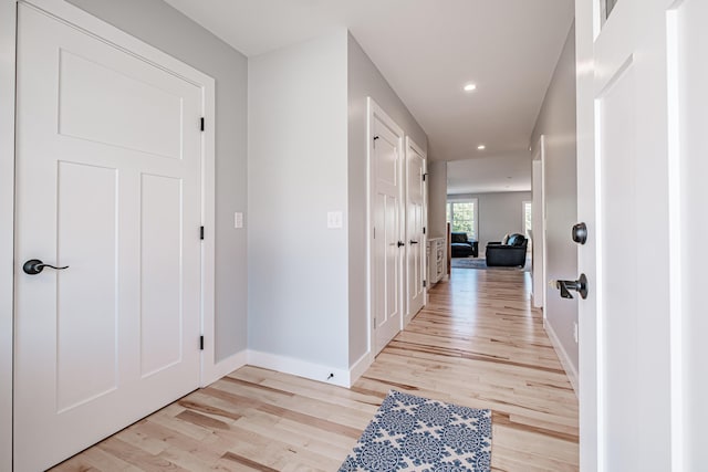 corridor featuring light hardwood / wood-style flooring