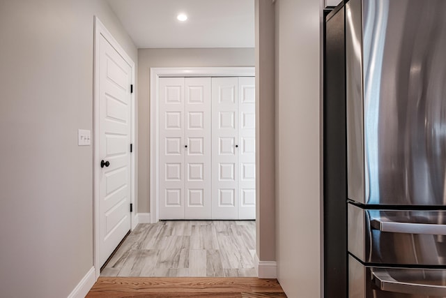 hallway featuring light hardwood / wood-style floors