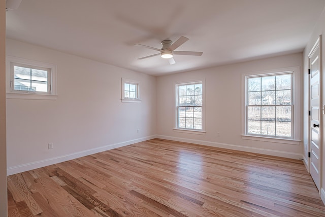 unfurnished room with ceiling fan and light hardwood / wood-style flooring