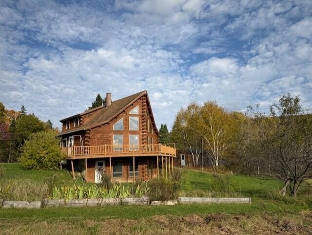 55 Brown Rd, Oakfield, ME 04763 - back of house featuring a deck