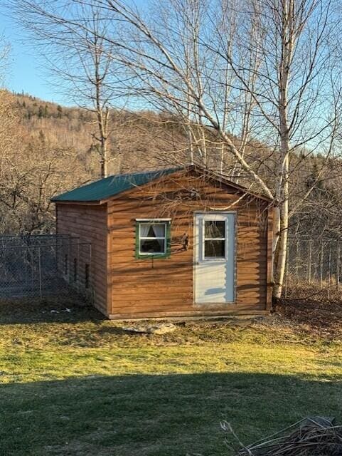 55 Brown Rd, Oakfield, ME 04763 - view of outdoor structure featuring a lawn