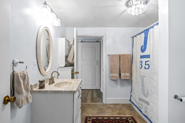 bathroom with vanity and a shower with curtain