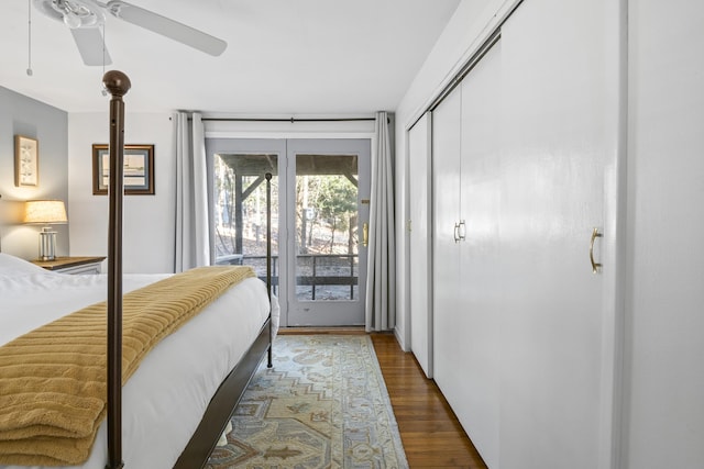 bedroom featuring a closet, ceiling fan, access to exterior, and dark hardwood / wood-style floors