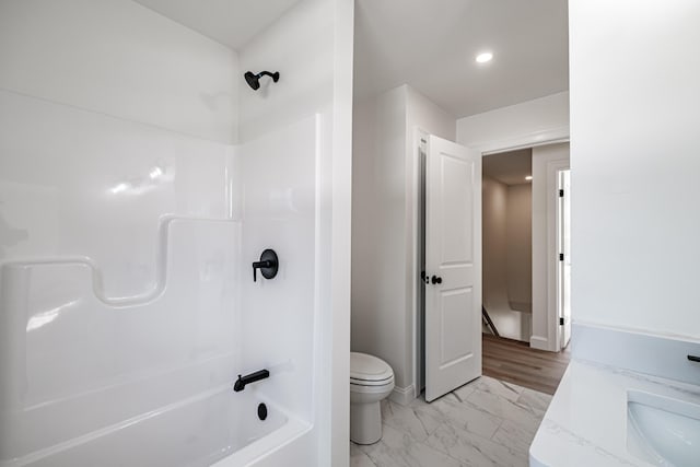 full bathroom featuring toilet, vanity, and shower / bath combination