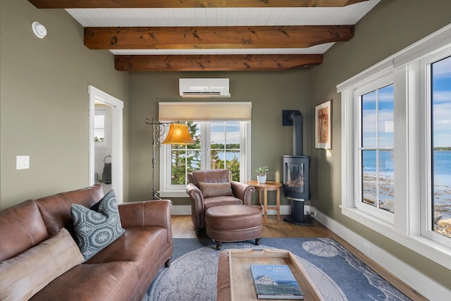 living room featuring wooden ceiling, an AC wall unit, a water view, beamed ceiling, and hardwood / wood-style flooring