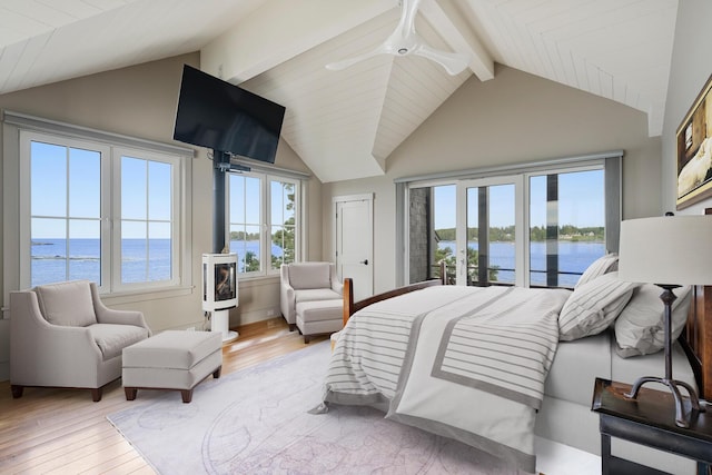 bedroom with wood ceiling, ceiling fan, vaulted ceiling with beams, and light wood-type flooring