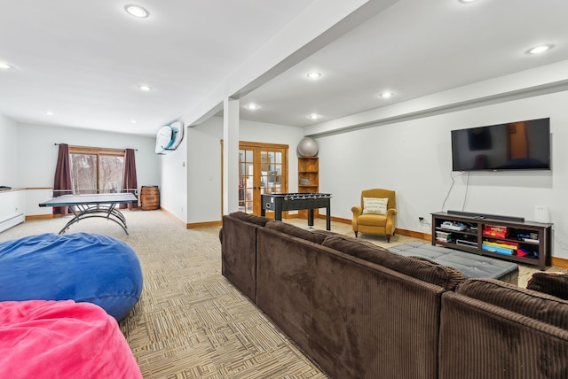 living room with light colored carpet and french doors