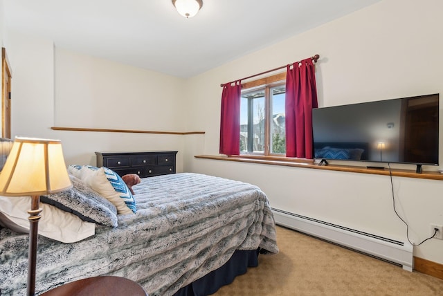 carpeted bedroom with baseboard heating