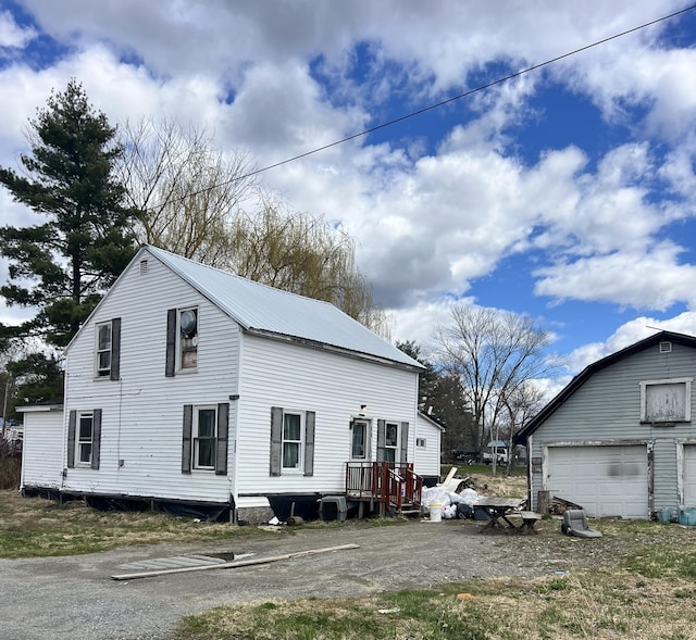 view of home's exterior with a garage