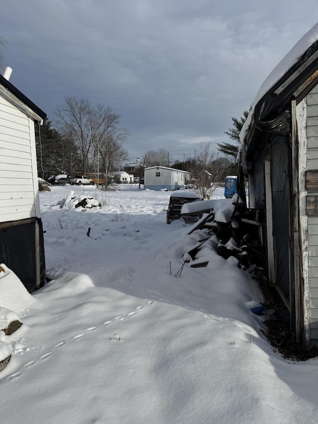 view of snowy yard