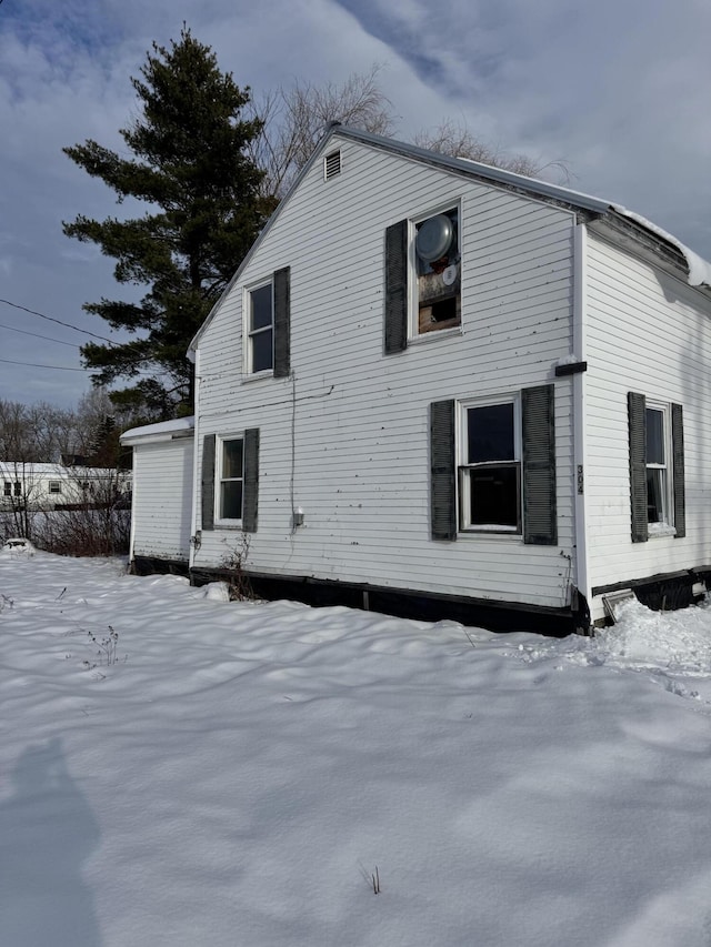 view of snow covered property