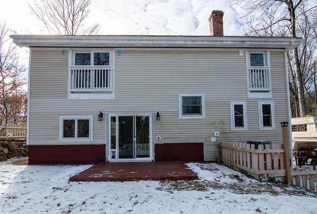 view of snow covered property