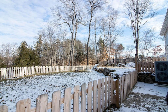 view of yard covered in snow