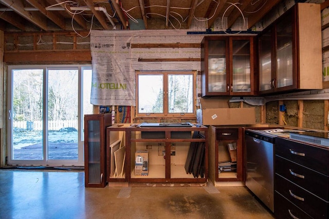 kitchen with dishwasher and concrete floors