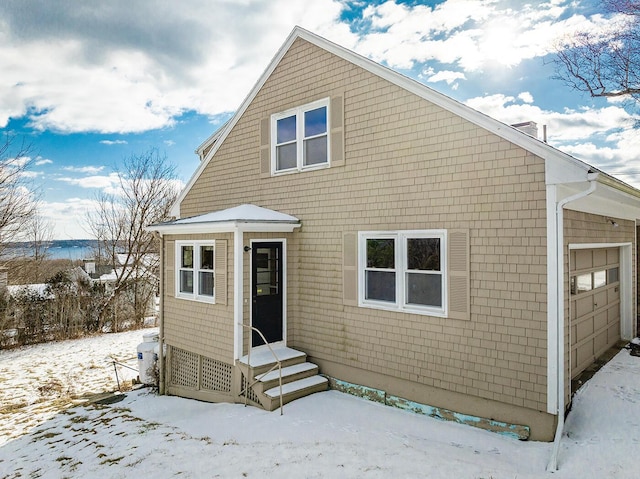 exterior space with a garage