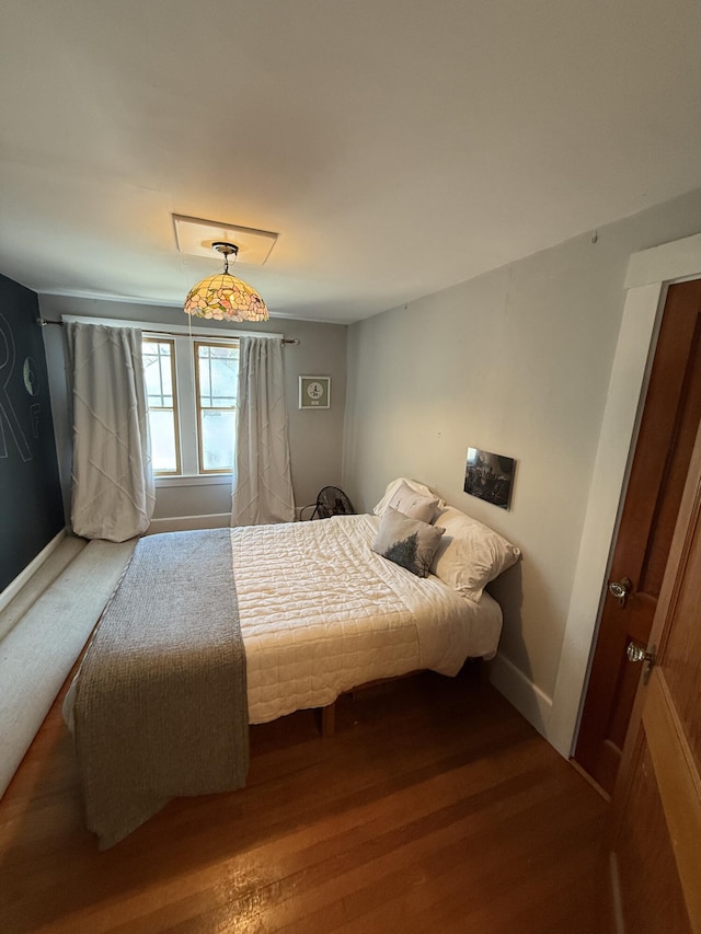 bedroom featuring hardwood / wood-style flooring