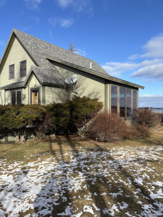 view of snow covered property