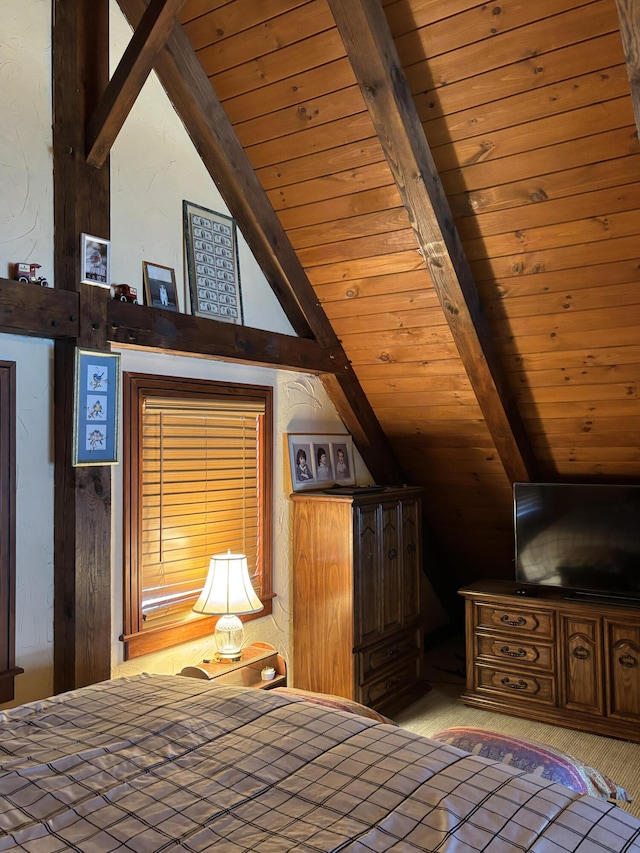 unfurnished bedroom with vaulted ceiling with beams and wooden ceiling