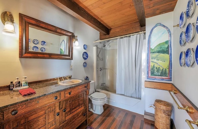 1 Moosabec Shrs, Jonesport, ME 04649 - full bathroom featuring wooden ceiling with exposed beams, wood finished floors, shower / bath combo with shower curtain, toilet, and vanity