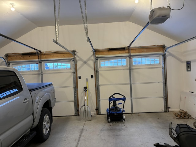 garage featuring a garage door opener