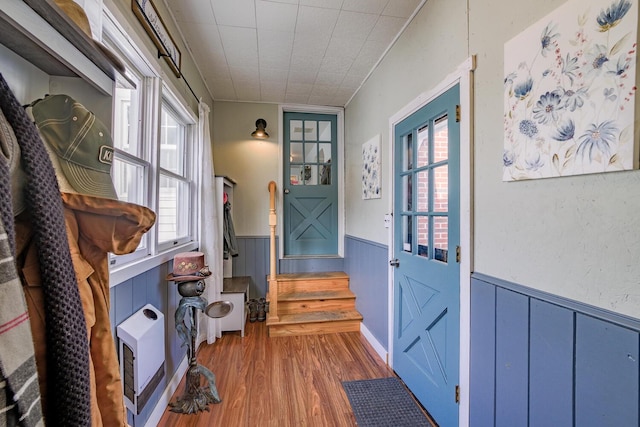 entryway with hardwood / wood-style floors