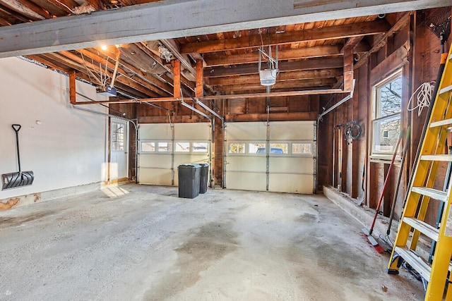 garage featuring a garage door opener